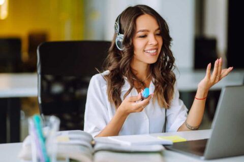 Receptionist helping a customer on the phone