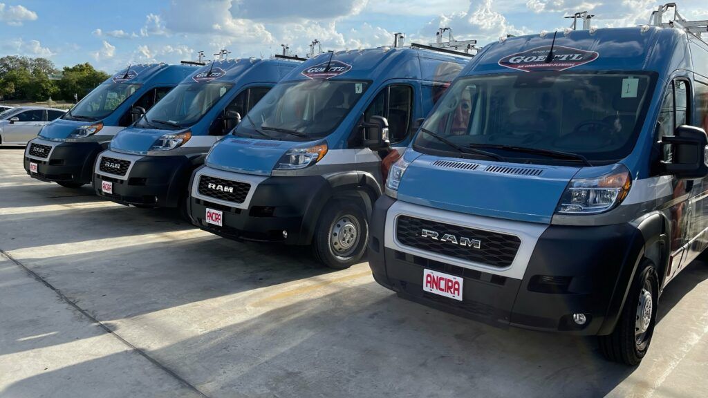 Local Business Commercial Vans Wrapped by Villar Auto Pros with Eye-catching Advertising Graphics